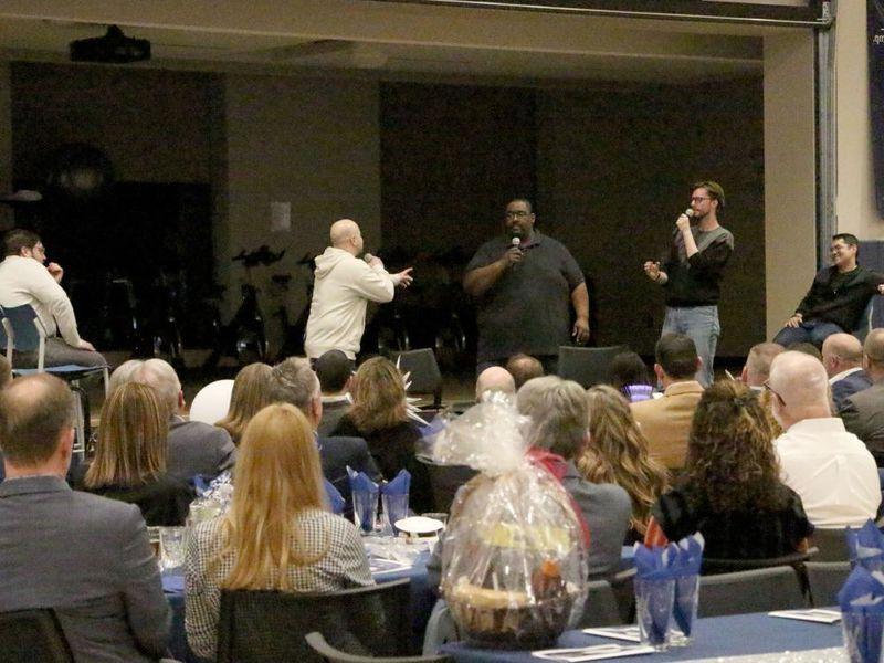 Happy Valley Improv performing on stage at the PAW Center during the Lions, Legacy and Laughter event during We Are Weekend at Penn State DuBois.